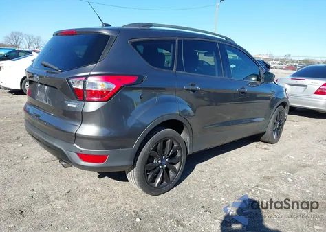 2017 Ford Escape Titanium z USA, uszkodzony, nr VIN 1FMCU0J98HUA93249
